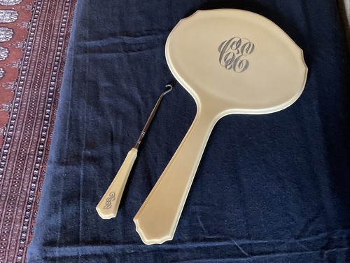 Vanity hand mirror and button - hand,