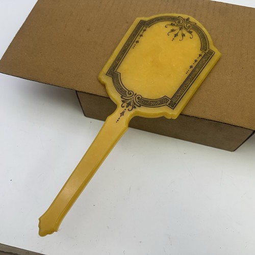 Vintage bakelite hand held - hand,